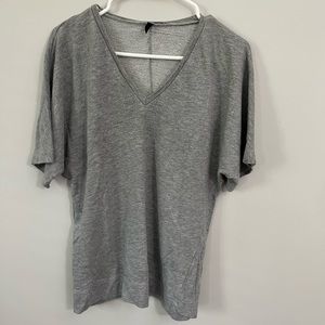 Short sleeve hoodie material shirt.